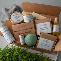 Clerina wellness items: wooden body brush, natural massage rollers, and organic tools